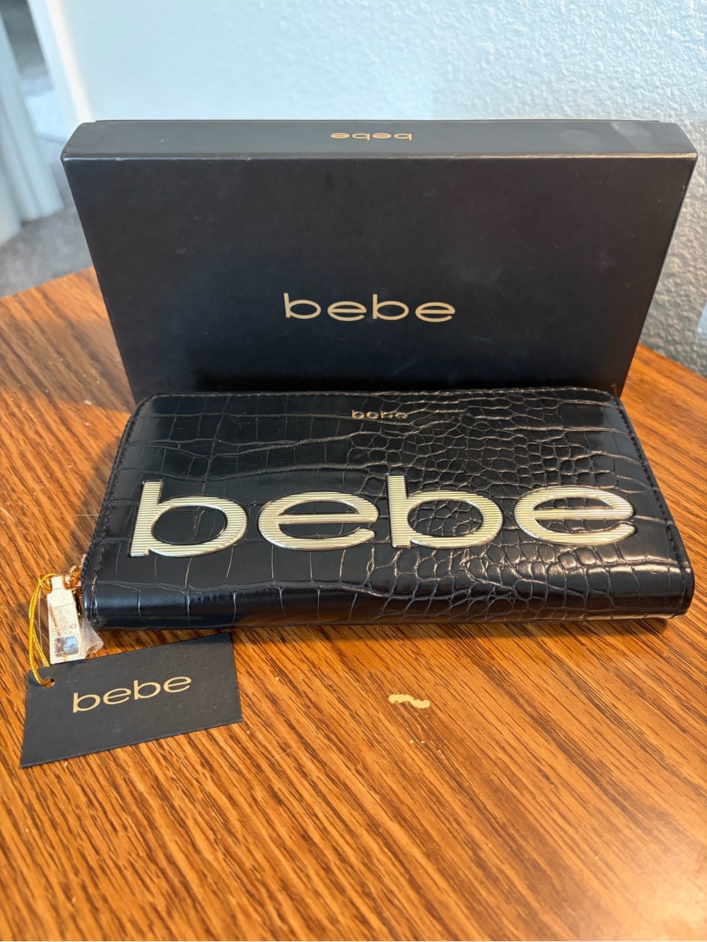 bebe Black Croc-Embossed Zip-Around Wallet with Gold Logo Accent